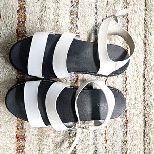 Black and white platform sandels.